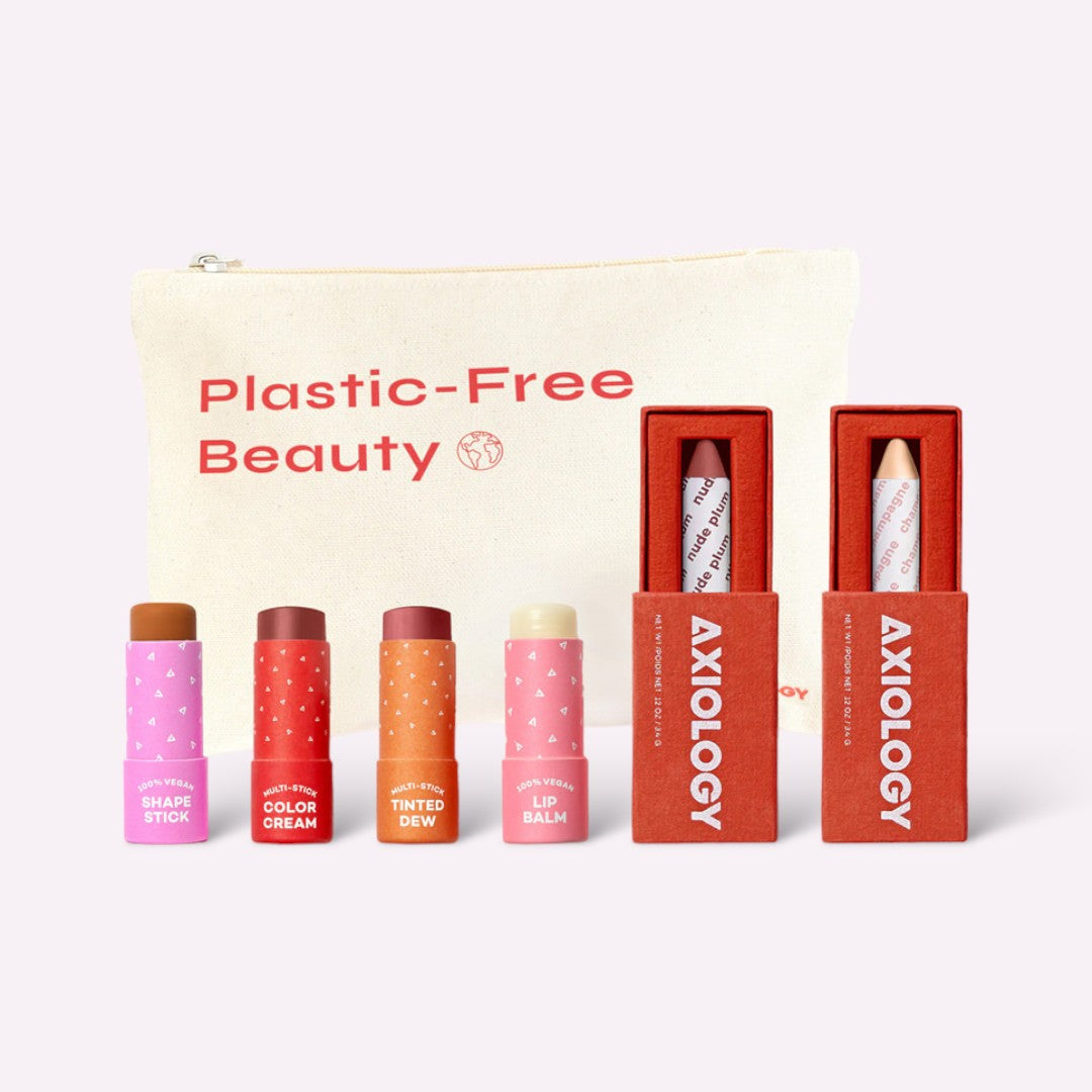 Set of Axiology lip balm products with a plastic-free beauty pouch on a white background