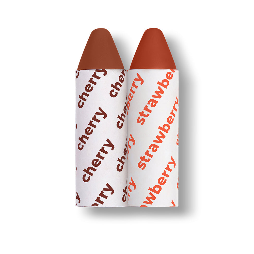 Two lip crayons with 'cherry' and 'strawberry' text on a white background