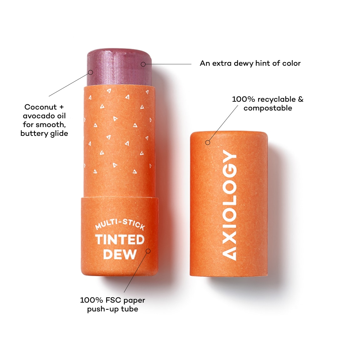 Axiology multi-stick tinted dew with features highlighted on a white background