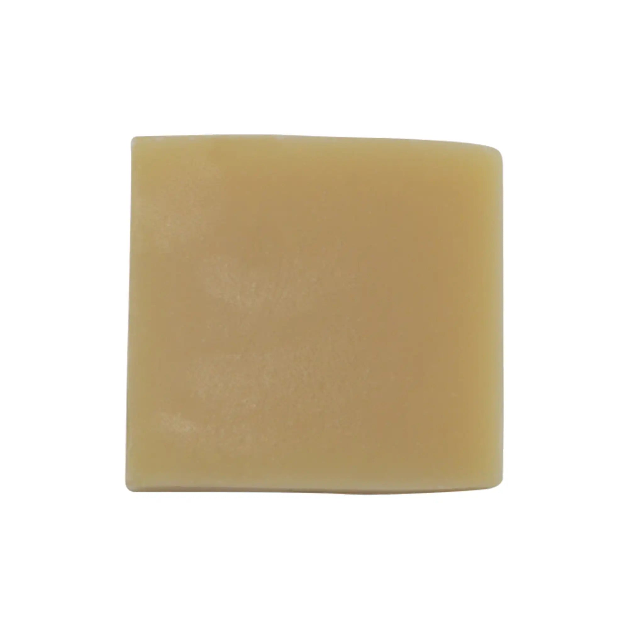 Yellow soap bar on a white background