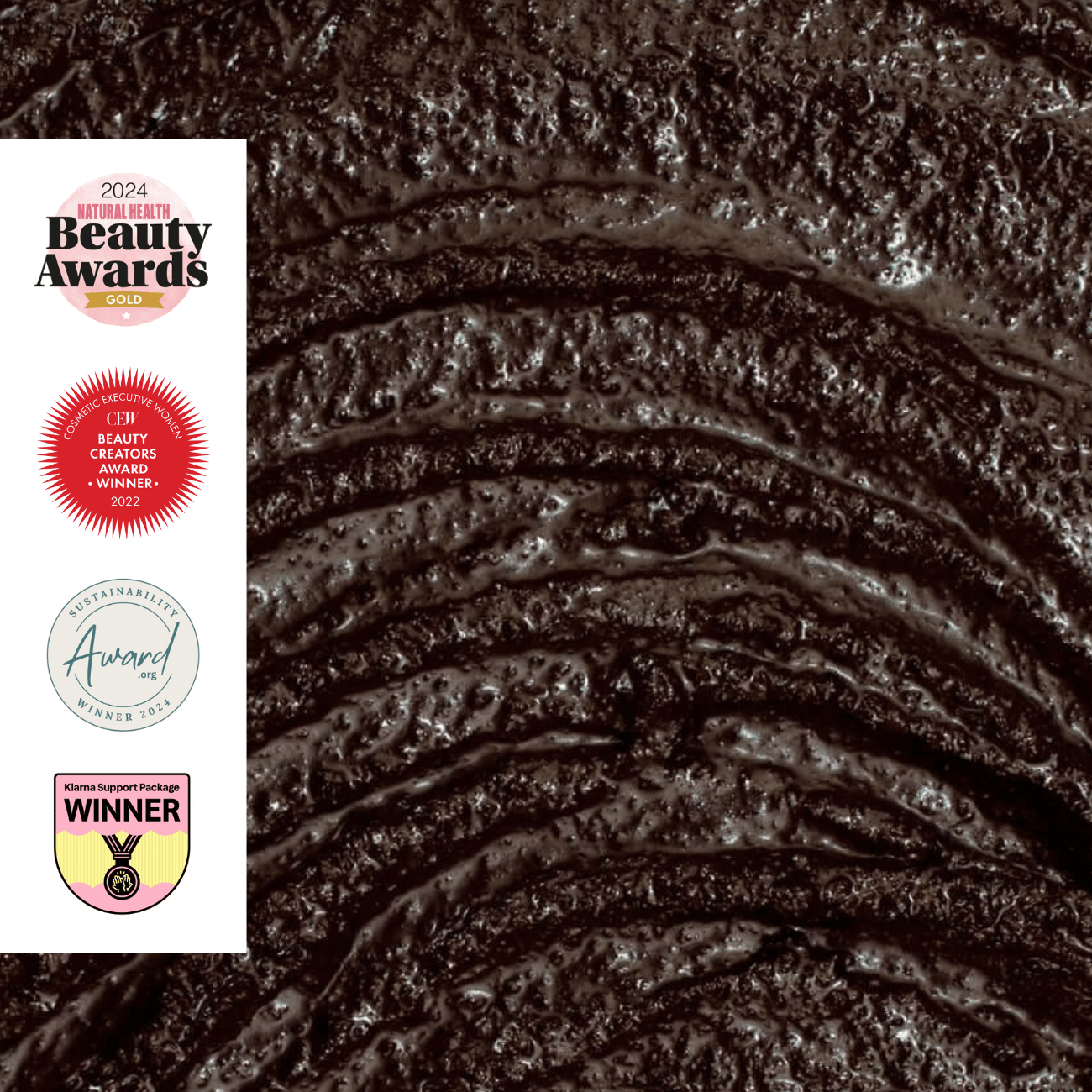 Close-up of coffee facial scrub texture with 2024 Beauty Awards logos on the left.
