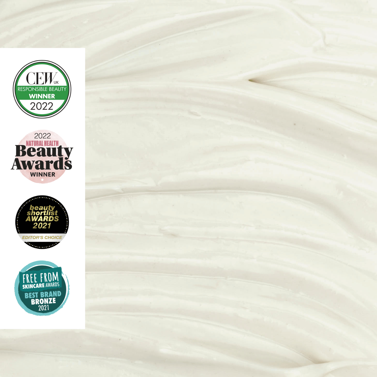 Close-up of face moisturizer texture with multiple awards logos on a white background