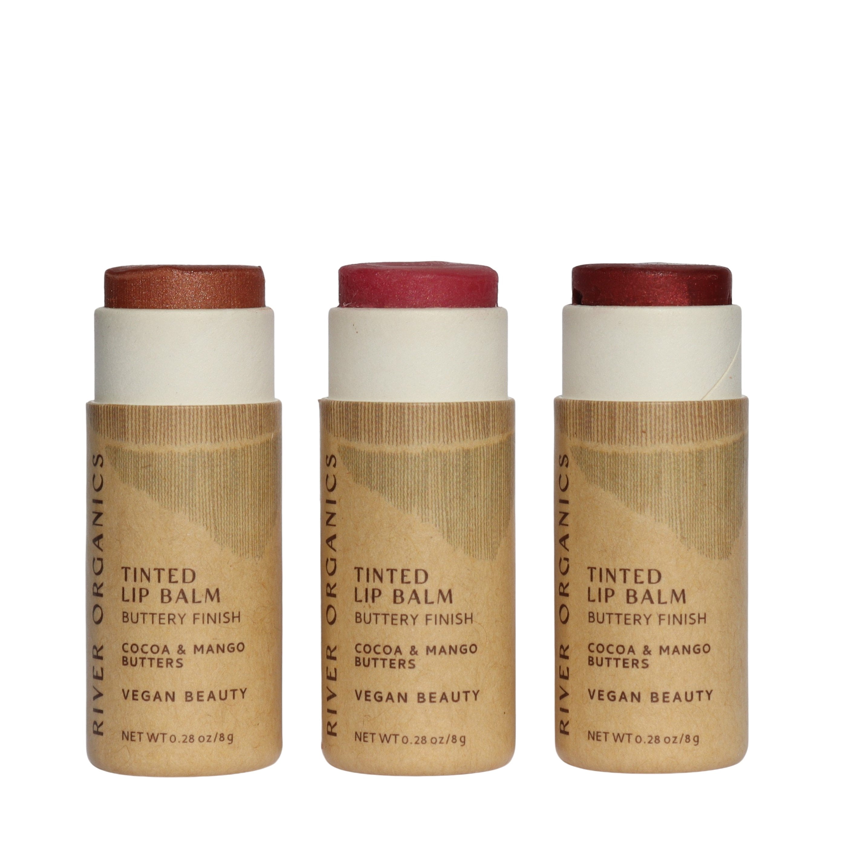 Three River Organics tinted lip balm tubes on a white background