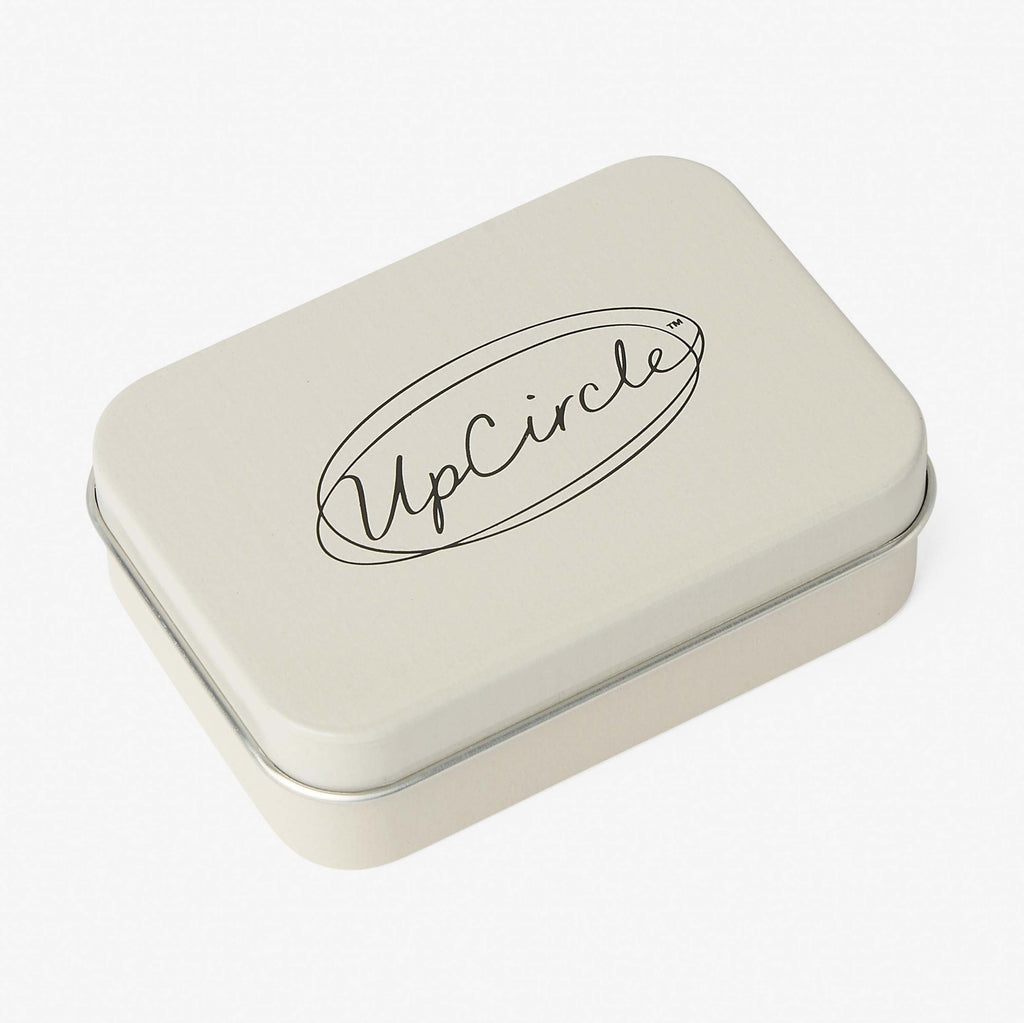 Rectangular tin box with 'UpCircle' logo on a white background