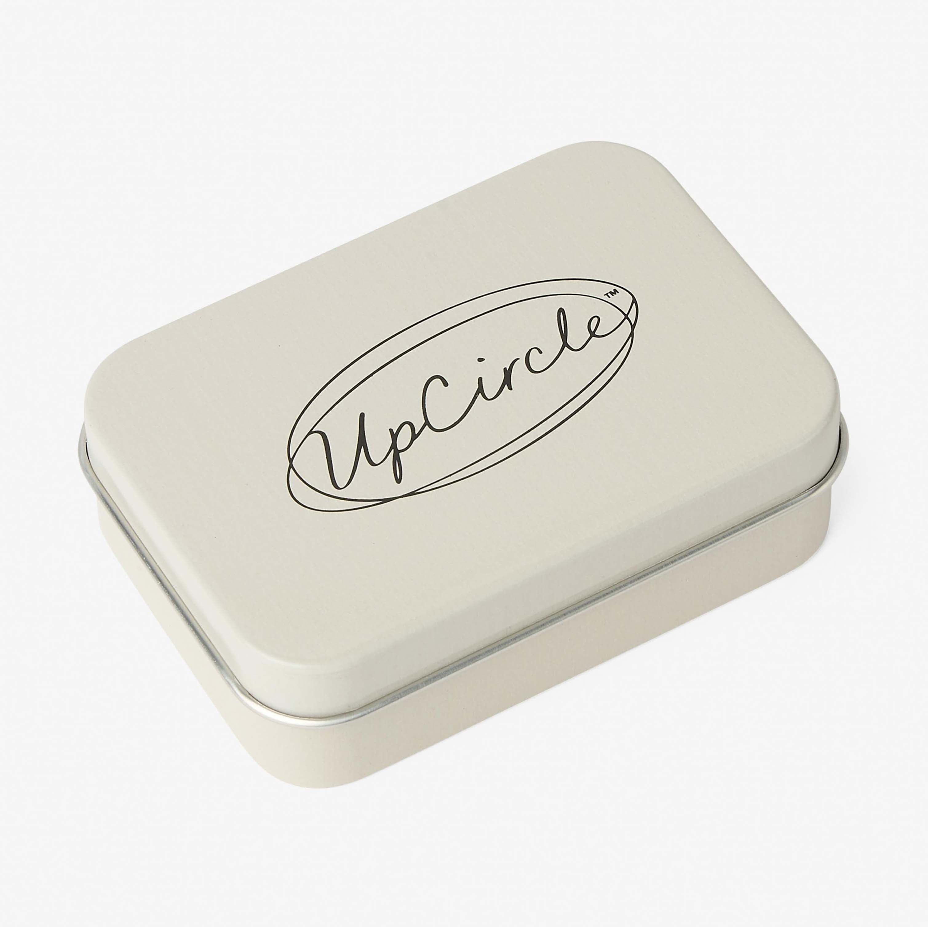 Rectangular tin box with 'UpCircle' logo on a white background