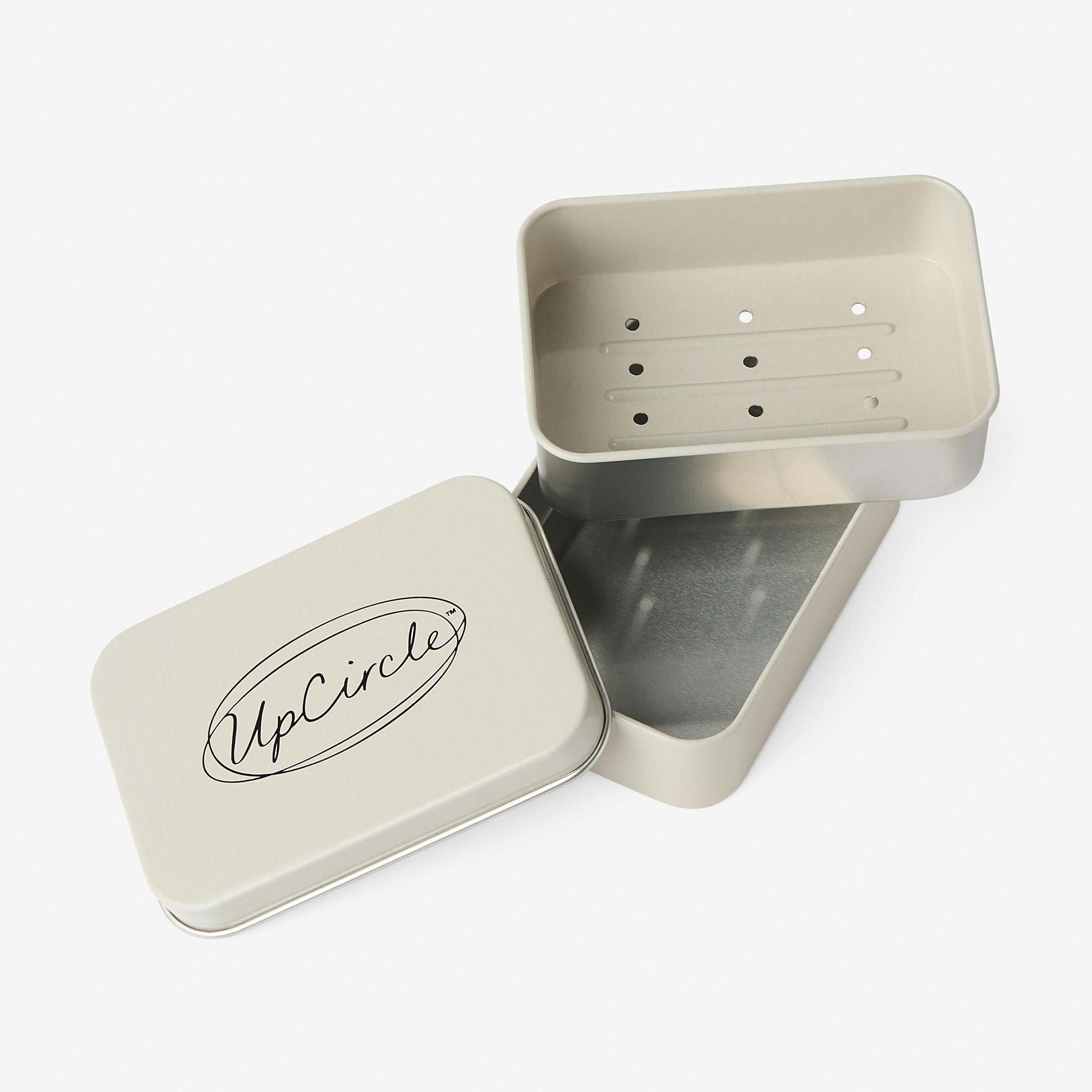 Metal soap dish with a lid featuring 'UpCircle' branding on a white background