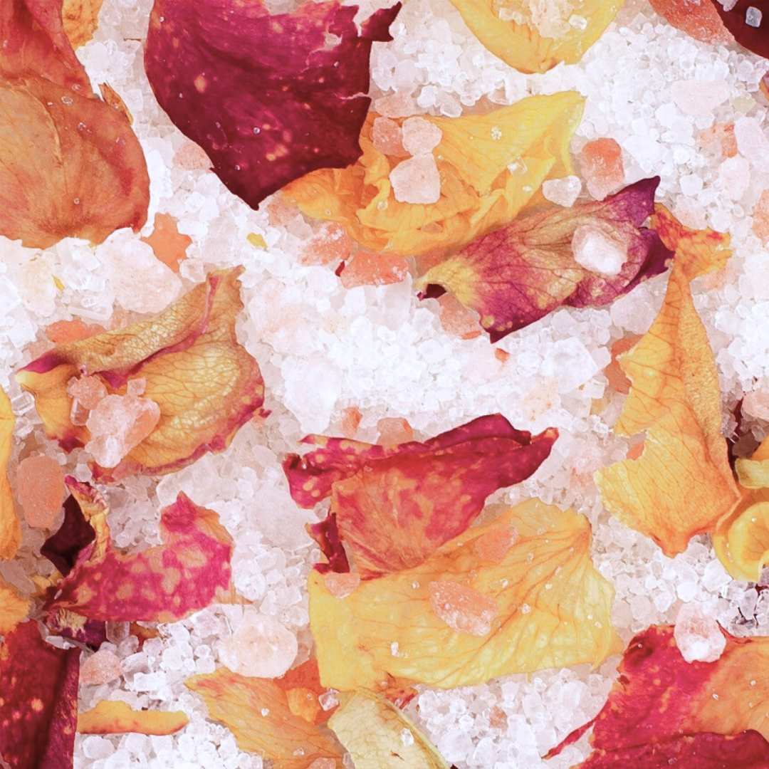 Close-up of colorful flower petals and bath salts