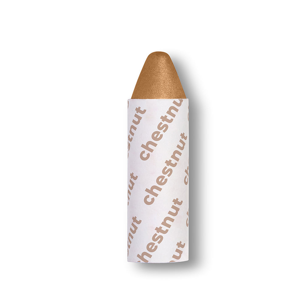 Cosmetic stick with 'chestnut' text on a white background