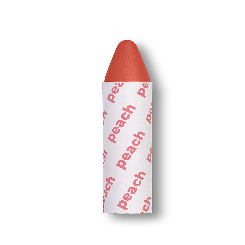 Peach-colored lip crayon with 'peach' text on a white background