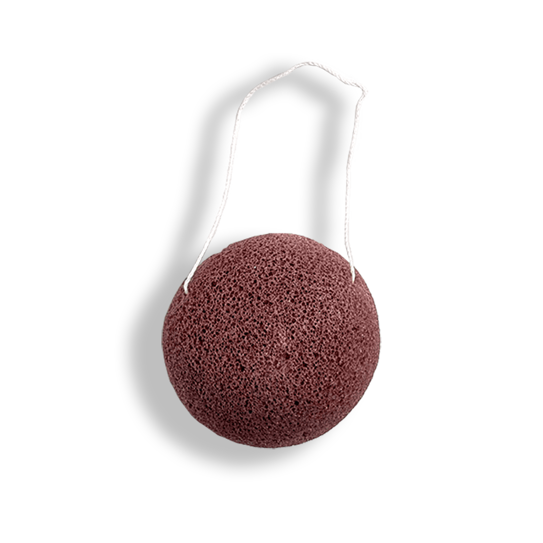 Brown konjac sponge with white handle on a transparent background