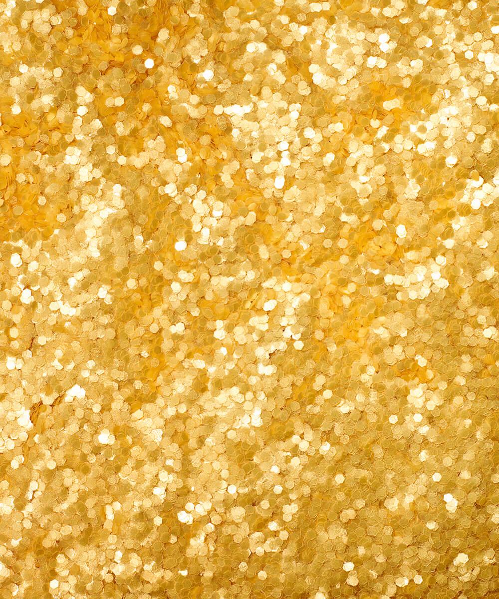 Close-up of gold glitter texture