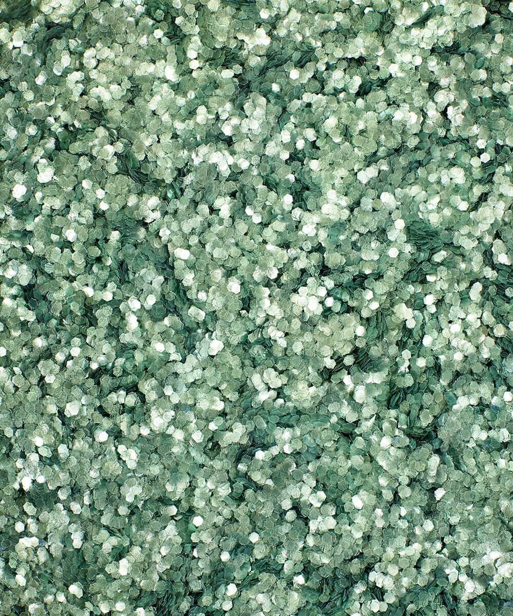 Close-up of green glitter texture