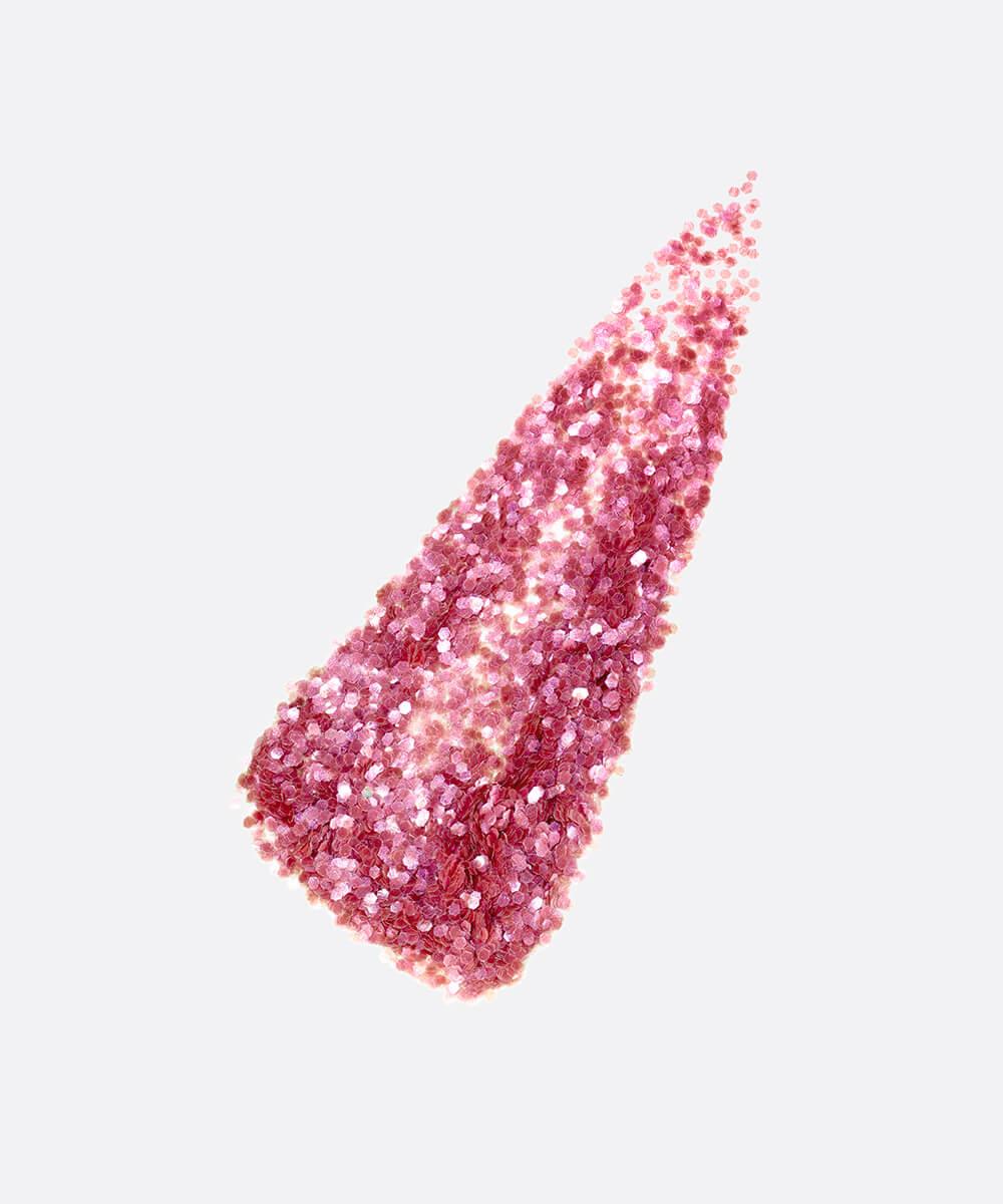 Pink glittery makeup swatch on a white background